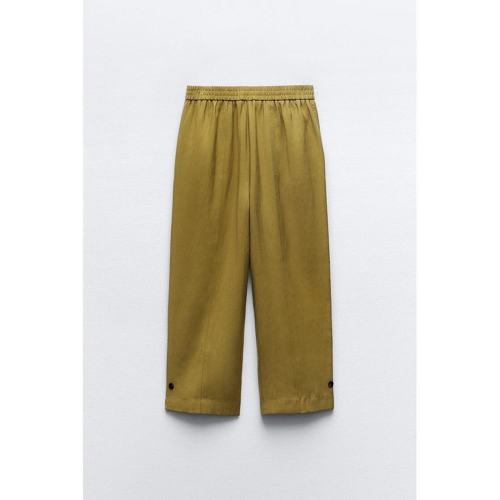 CUFFED TAPERED PANTS WITH BUTTON STRAPS